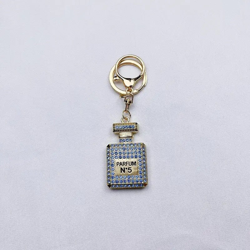 Wholesale Diamond-studded perfume bottle creative metal keychain